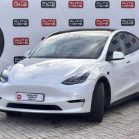 Tesla Model Y — миниатюра 1