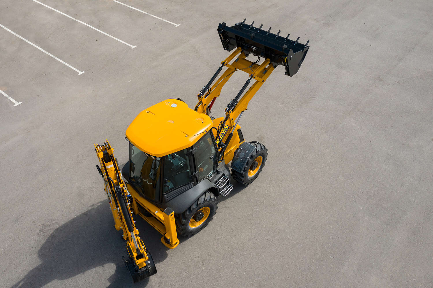 В России будут выпускать копии дорожно-строительной техники фирмы JCB трактор 3
