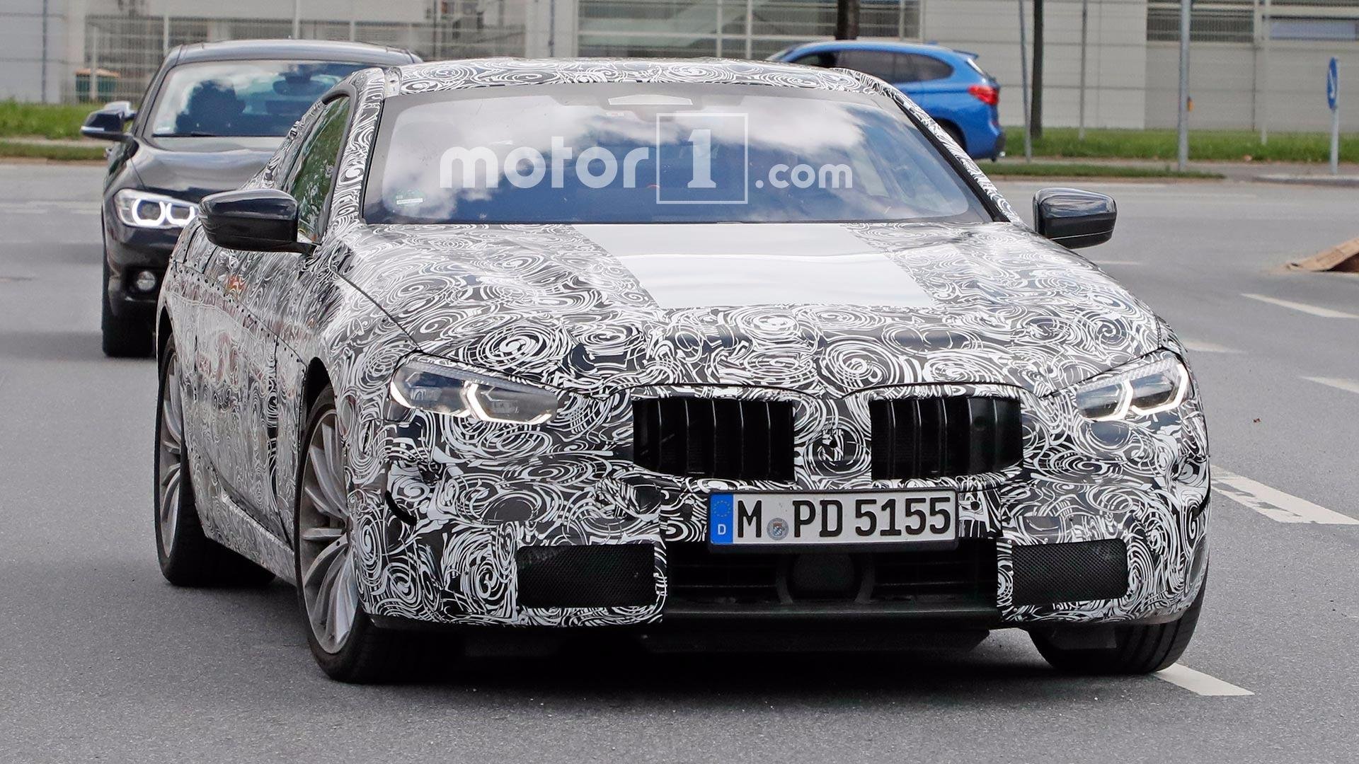 Шпионские фотографии BMW 8 Series "засветили" оптику нового купе фотографии нового купе BMW 8 Series с серийной оптикой